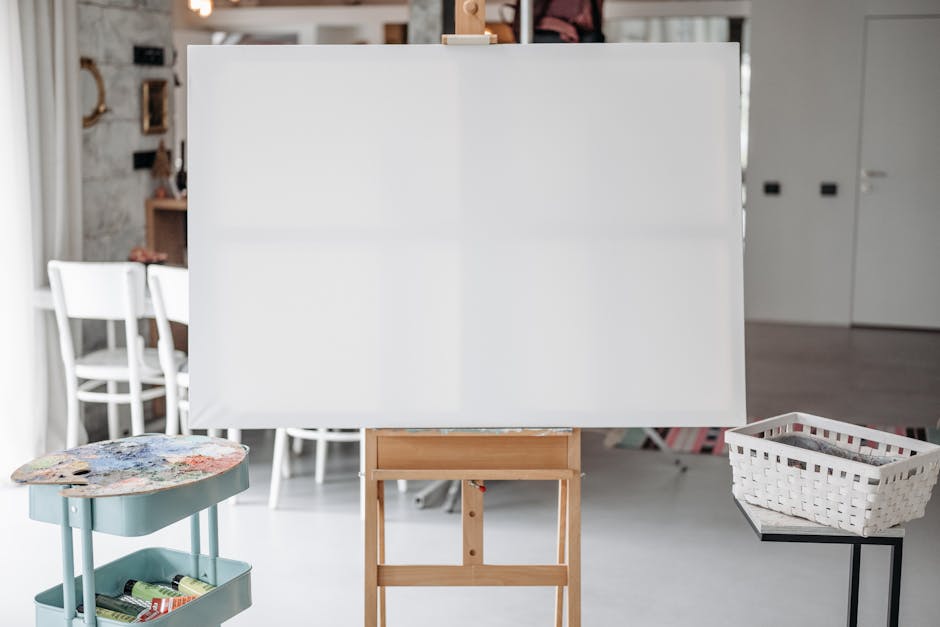 Blank canvas on an easel in an art studio setting, awaiting creativity.